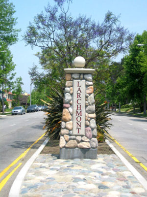 WELCOMING SIGN at median between First and Third streets  greets visitors to Larchmont.