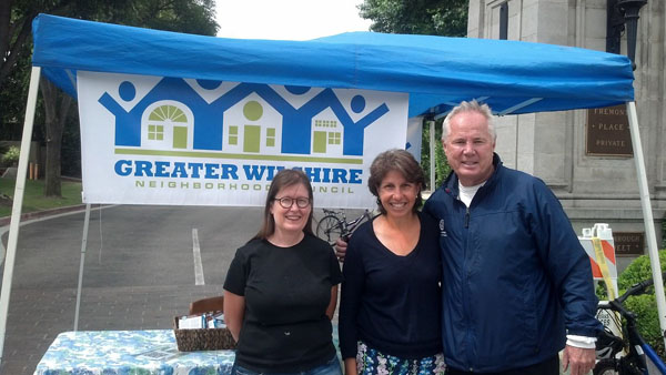 COUNCILMAN Tom LaBonge joined Liz Fuller and Patty Lombard at the Greater Wilshire Neighborhood Council booth in front of Fremont Place.