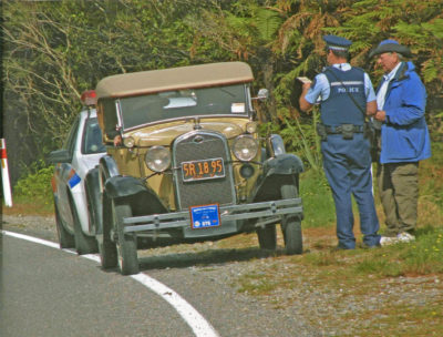 INSTEAD OF A speeding ticket, a New Zealand cop gave Wayne Thomas a lesson in kilometers vs. miles per hour after being pulled over for speeding in his 1931 Ford Deluxe Roadster.