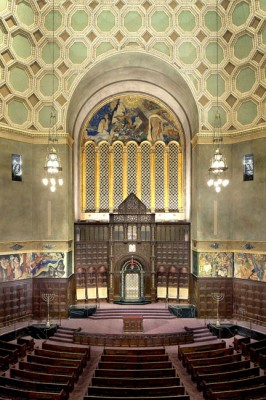 BIMAH or stage on which services are conducted with the ark, which holds the Torah, in the center. 