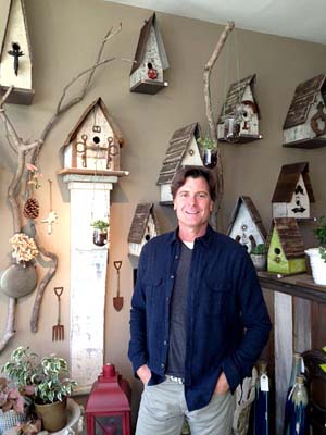BIRDHOUSES sold at Robert Fisher’s landscape store are made of reclaimed wood from barns and old houses.