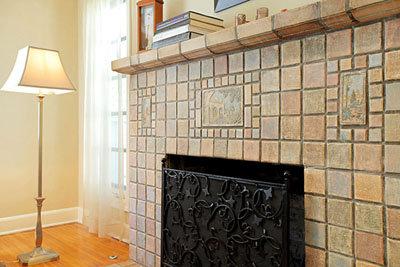FIREPLACE in home on  Sycamore Ave. features Batchelder tiles.Photo by Andrew Burk 