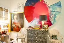 COLORFUL ART and Old World antiques blend in at the Citrus House featured in the book.