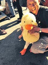 A TYKE dressed as a duck won applause at the costume contest.