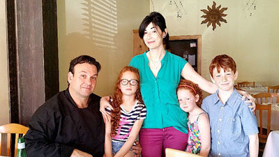 IT’S A FAMILY enterprise. Steve and Joanna Vernetti with Sheila, Lola and Bruno, in the new restaurant.