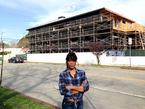 DELAY AT THE CITY is frustrating Barbara Savage, president of the La Brea-Hancock Association, here in front of a three-story home at the corner of  6th St. and Orange Ave.