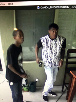 Two suspects are captured on security camera attempting to burglarize a local home. 