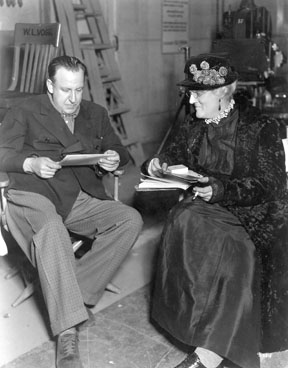 DIRECTOR Tod Browning with “Devil Doll” star Lionel Barrymore in drag, 1936.