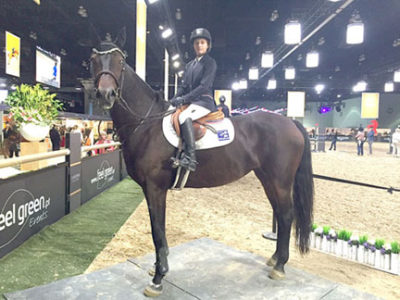 ALYCE BITTAR sits tall on her horse, Cara B, at the Longines Masters competition in October.