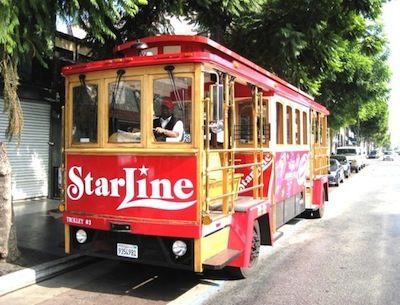 A STARLINE TROLLEY will  transport shoppers up and down Larchmont Boulevard.
