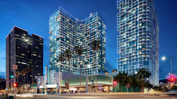 The proposed "Palladium Residences" mixed-use project, approved by the Los Angeles City Planning Commission in December, is depicted at right. At left is Kilroy Realty Corporation's existing "Sunset Media Center" tower at 6255 Sunset Blvd., home to the AIDS Healthcare Foundation headquarters offices.
