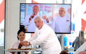 DRAGO BROTHERS / CHEFS Giacomino and Tanino are on the screen behind Celestino.
