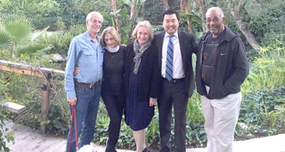STREAM BRIDGING: At the Brookside Homeowners’ Association annual meeting in 2015, new Councilman David Ryu said he would like to see the famous stream that gives the community its name. In a recent visit with residents, he got his wish. Pictured, L to R and adjacent to one of the backyard bridges, are Pete and Patty Allee, Sandy Boeck, Councilman Ryu, and Owen Smith.