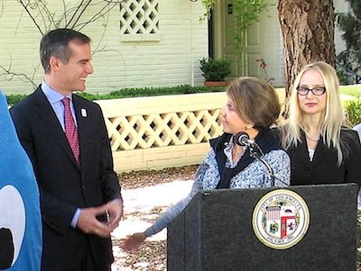 Mayor Garcetti Acknowledges Water Savings by Patty Lombard and Bill Simon at their Fremont Place Home. Greater Wilshire Neighborhood Council Water Conservation Committee Co-Chair Julie Stromberg at Right.