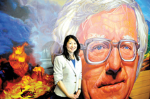 PRINCIPAL Dr. Helena Yoon-Fontamillas stands in front of a new mural at Los Angeles High School. 