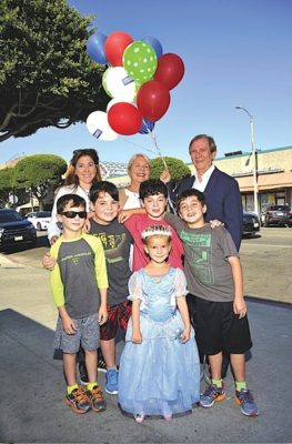 PREPARING for the Larchmont Family Fair are (princess) Nikka Gueler, Luke and T.J. Brunelle, Sam and Max Terr. In the back row are Vivian Gueler and Betsy Malloy, co-chairmen, and John Winther, Larchmont Boulevard Assoc. president. Photo by Bill Devlin.