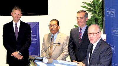 TEMPLE Rabbis M. Beaumont Shapiro, left, and Steven Z. Leder, right, join City Council President Herb Wesson and Mayor Eric Garcetti at the dedication.