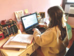 With social distancing decree, families begin work-from-home, homeschooling juggling act